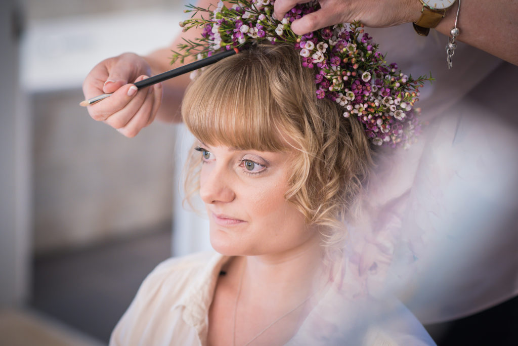 bride getting hair done